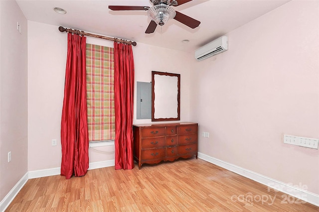 729 Lochaven Rd, Waxhaw, NC 28173 - unfurnished bedroom with a wall mounted AC, light wood finished floors, electric panel, and baseboards