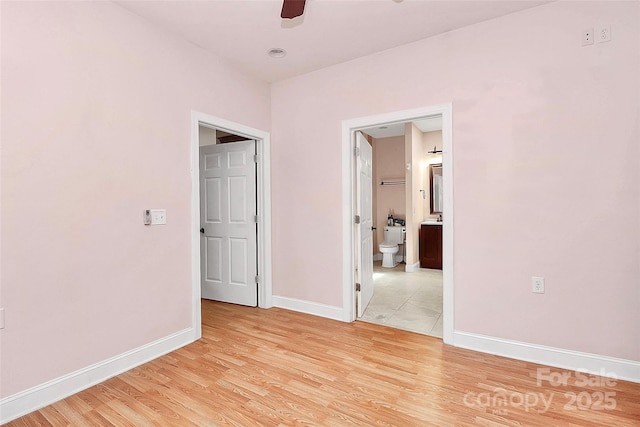 729 Lochaven Rd, Waxhaw, NC 28173 - unfurnished room with a ceiling fan, baseboards, and light wood-type flooring