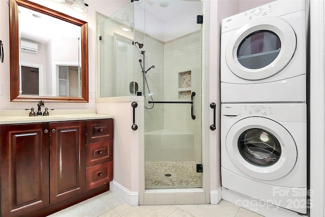 729 Lochaven Rd, Waxhaw, NC 28173 - bathroom featuring stacked washer and clothes dryer, a stall shower, tile patterned floors, vanity, and an AC wall unit