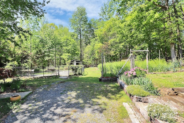 729 Lochaven Rd, Waxhaw, NC 28173 - view of yard with an outbuilding and a shed
