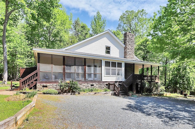 729 Lochaven Rd, Waxhaw, NC 28173 - farmhouse inspired home with stairway, a chimney, and a sunroom