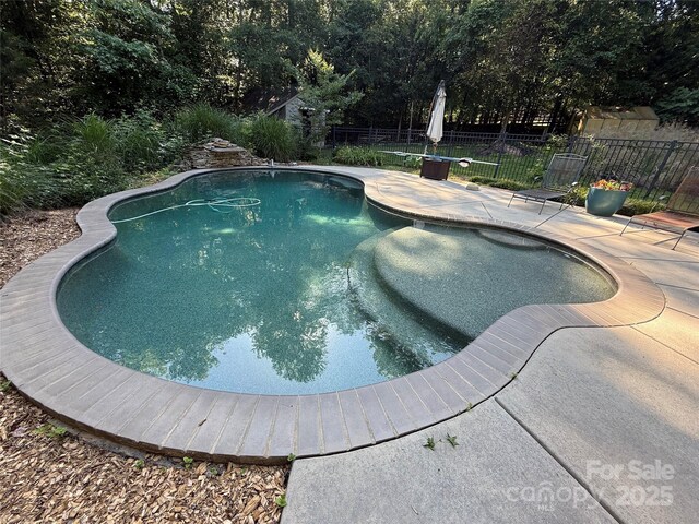 729 Lochaven Rd, Waxhaw, NC 28173 - view of pool featuring fence and a patio area