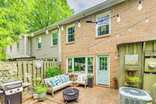 4607 Hedgemore Dr Unit H, Charlotte, NC 28209 - rear view of property featuring outdoor lounge area, fence, a patio area, and cooling unit