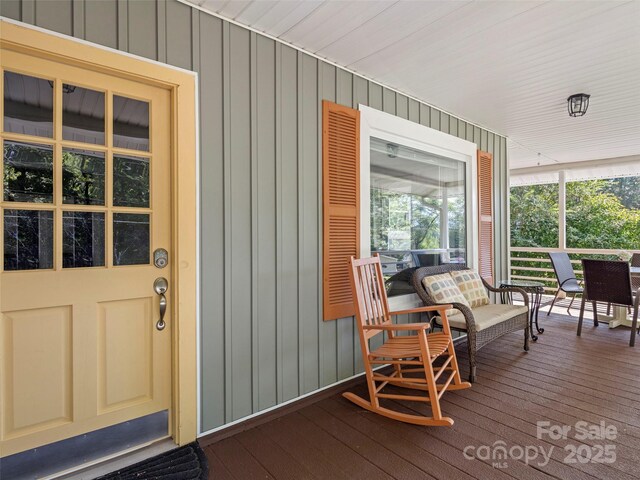 exterior space featuring board and batten siding and a porch
