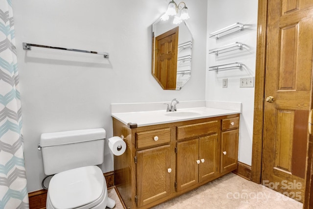 full bath with toilet and vanity