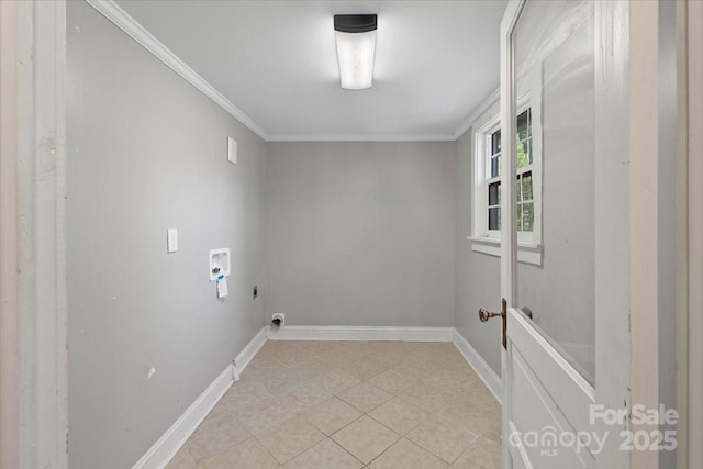 washroom featuring light tile patterned flooring, hookup for a washing machine, ornamental molding, and laundry area