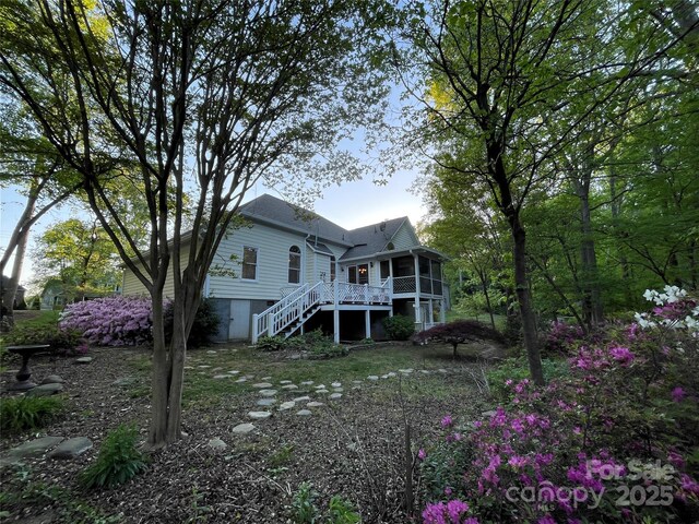 121 General Pemberton St, Stanley, NC 28164 - back of house with a sunroom and stairs