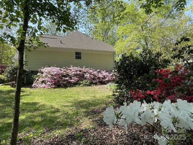 121 General Pemberton St, Stanley, NC 28164 - exterior space with a shingled roof and a lawn