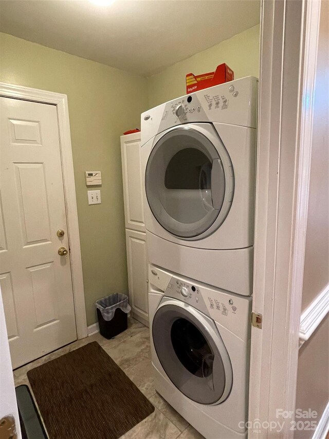 121 General Pemberton St, Stanley, NC 28164 - clothes washing area with stacked washer and dryer and cabinet space