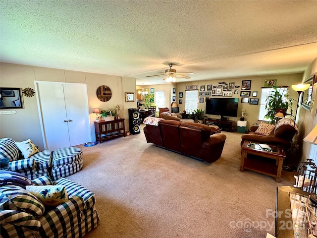 2084 Bristol Creek Ave, Morganton, NC 28655 - living area featuring a ceiling fan, a textured ceiling, a wealth of natural light, and light carpet