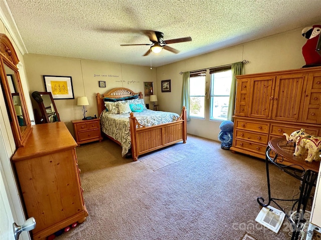 2084 Bristol Creek Ave, Morganton, NC 28655 - bedroom featuring a textured ceiling, ceiling fan, and carpet