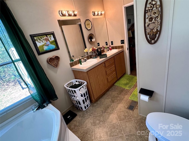 2084 Bristol Creek Ave, Morganton, NC 28655 - full bathroom featuring visible vents, a sink, a bath, and double vanity