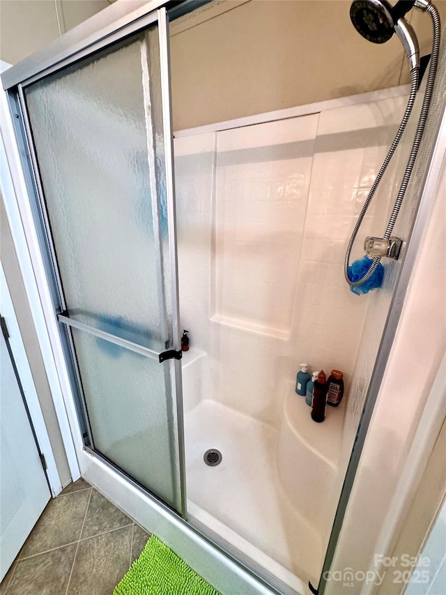 2084 Bristol Creek Ave, Morganton, NC 28655 - bathroom with tile patterned floors and a stall shower
