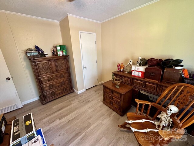 2084 Bristol Creek Ave, Morganton, NC 28655 - office featuring baseboards, ornamental molding, a textured ceiling, and wood finished floors