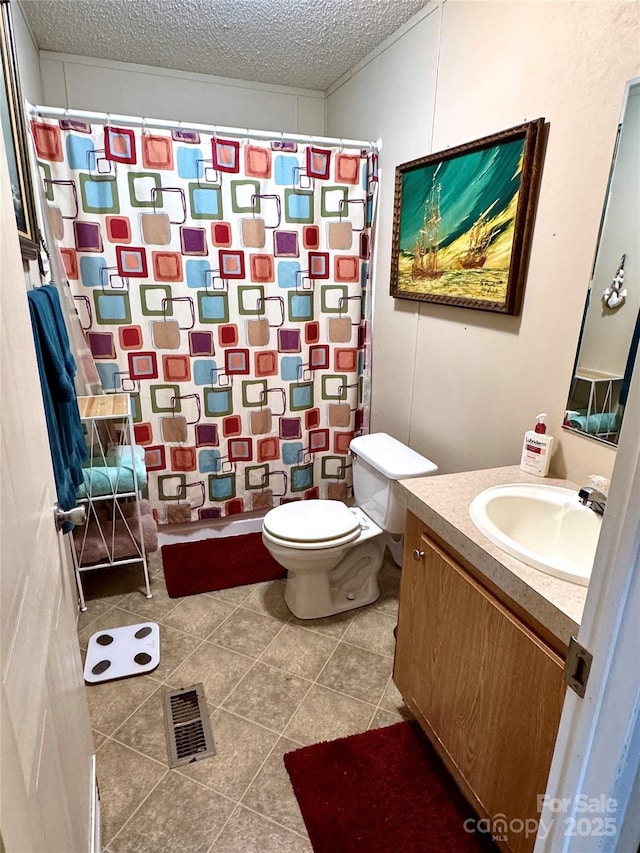 2084 Bristol Creek Ave, Morganton, NC 28655 - full bath featuring vanity, toilet, a textured ceiling, curtained shower, and visible vents