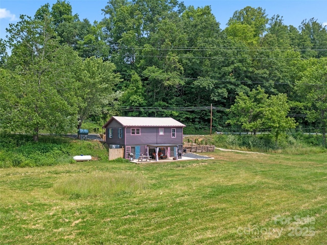 1767 N 226th Hwy, Bakersville, NC 28705 - view of yard with a patio area and a view of trees