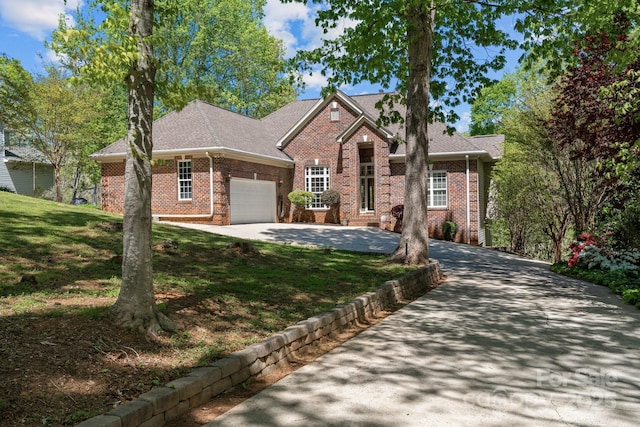 7748 Long Bay Pkwy, Catawba, NC 28609 - traditional-style house featuring brick siding, an attached garage, driveway, and a front yard