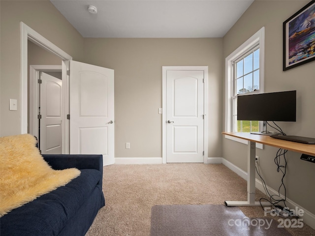 carpeted bedroom with baseboards
