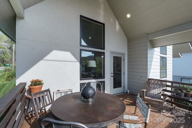 deck with outdoor dining space