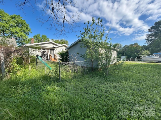 view of yard with fence