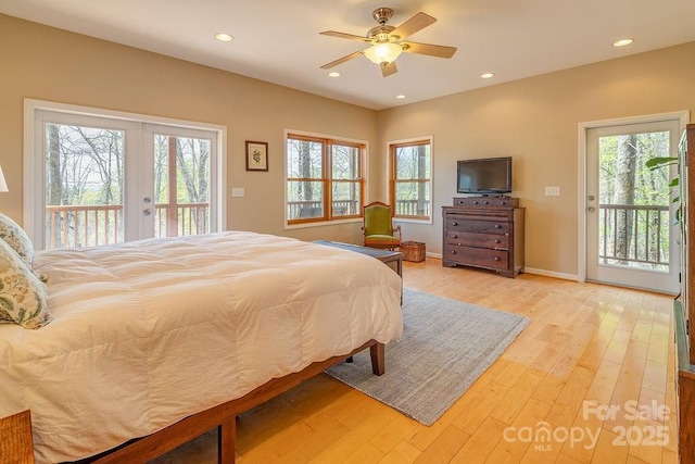 bedroom featuring access to outside, french doors, and multiple windows