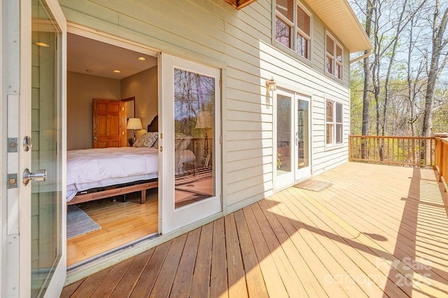 wooden deck featuring french doors