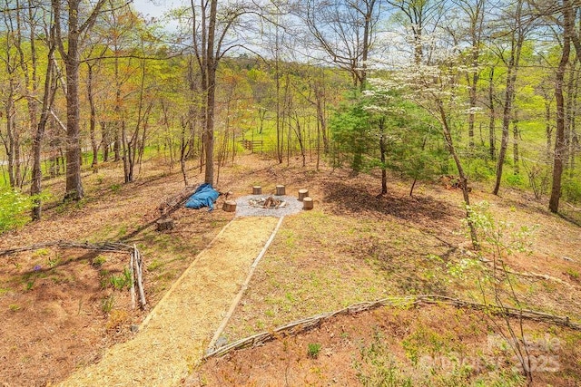 bird's eye view featuring a forest view