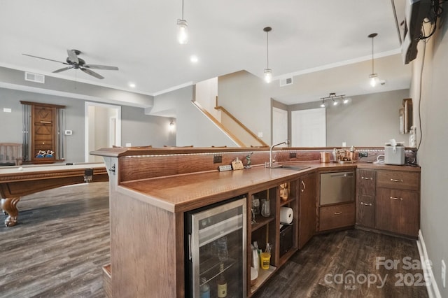 2501 Mt Isle Harbor Dr, Charlotte, NC 28214 - kitchen with wine cooler, dishwasher, visible vents, a sink, and dark wood-style flooring