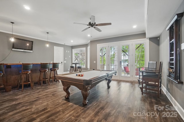2501 Mt Isle Harbor Dr, Charlotte, NC 28214 - recreation room with a ceiling fan, wood finished floors, pool table, bar, and ornamental molding