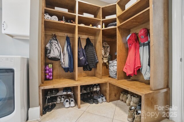 2501 Mt Isle Harbor Dr, Charlotte, NC 28214 - mudroom with washer / clothes dryer and tile patterned floors