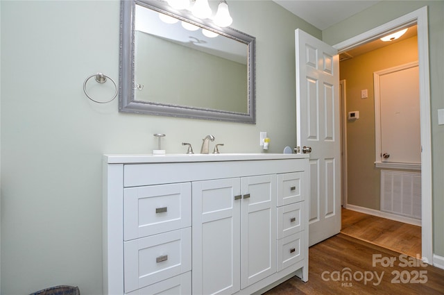 1222 Glenarden Dr, Rock Hill, SC 29730 - bathroom with visible vents, wood finished floors, and vanity