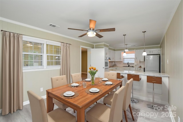 1222 Glenarden Dr, Rock Hill, SC 29730 - dining area with crown molding, a ceiling fan, and visible vents