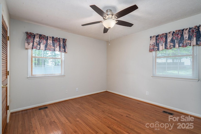 1 Horace Grigg Cir, Shelby, NC 28152 - unfurnished room with wood finished floors, baseboards, a ceiling fan, and visible vents