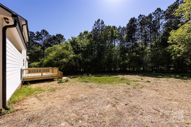 view of yard featuring a deck