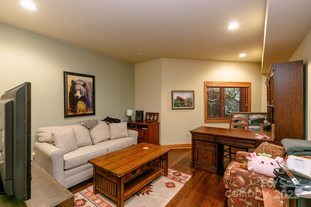 living area featuring baseboards, dark wood-style floors, and recessed lighting