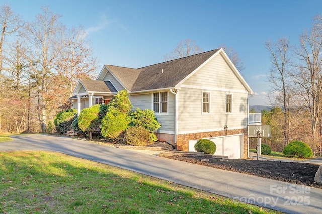 61 Buckle Rdg, Weaverville, NC 28787 - view of property exterior with driveway and a garage