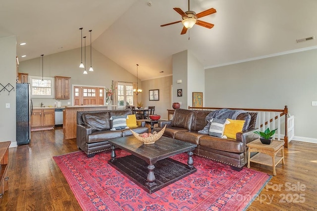 61 Buckle Rdg, Weaverville, NC 28787 - living area with high vaulted ceiling, a ceiling fan, dark wood-style flooring, a chandelier, and baseboards