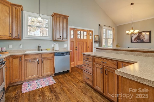 61 Buckle Rdg, Weaverville, NC 28787 - kitchen with stainless steel appliances, a sink, a chandelier, dark wood-style floors, and brown cabinetry