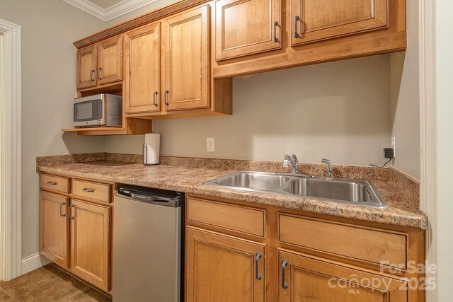 61 Buckle Rdg, Weaverville, NC 28787 - kitchen featuring dishwasher, a sink, stainless steel microwave, ornamental molding, and light countertops