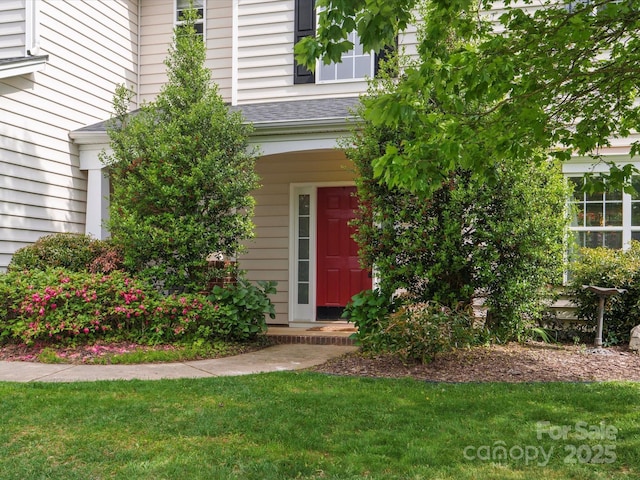 14220 Stewarts Bend Ln, Charlotte, NC 28277 - view of exterior entry featuring a yard