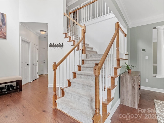 14220 Stewarts Bend Ln, Charlotte, NC 28277 - stairs featuring crown molding, baseboards, and wood finished floors