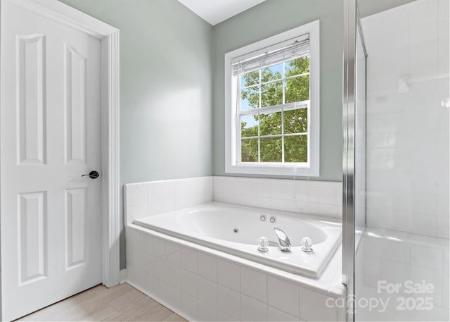 14220 Stewarts Bend Ln, Charlotte, NC 28277 - full bathroom featuring a tile shower, a tub with jets, and wood finished floors