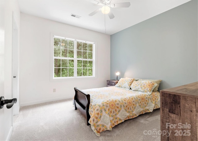 14220 Stewarts Bend Ln, Charlotte, NC 28277 - carpeted bedroom featuring baseboards, visible vents, and ceiling fan