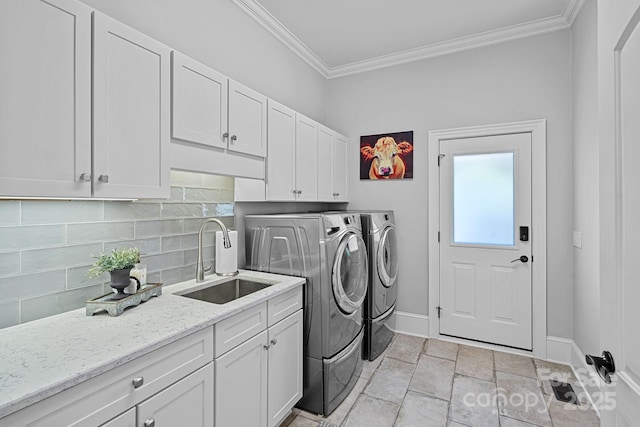 17040 Jetton Rd, Cornelius, NC 28031 - clothes washing area with independent washer and dryer, ornamental molding, cabinet space, and baseboards