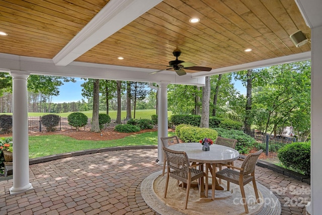 17040 Jetton Rd, Cornelius, NC 28031 - view of patio with fence, ceiling fan, outdoor dining space, and view of scattered trees