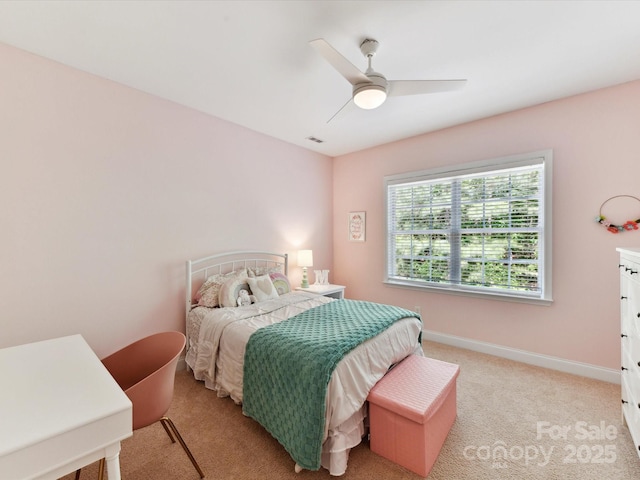bedroom with baseboards, carpet flooring, and ceiling fan
