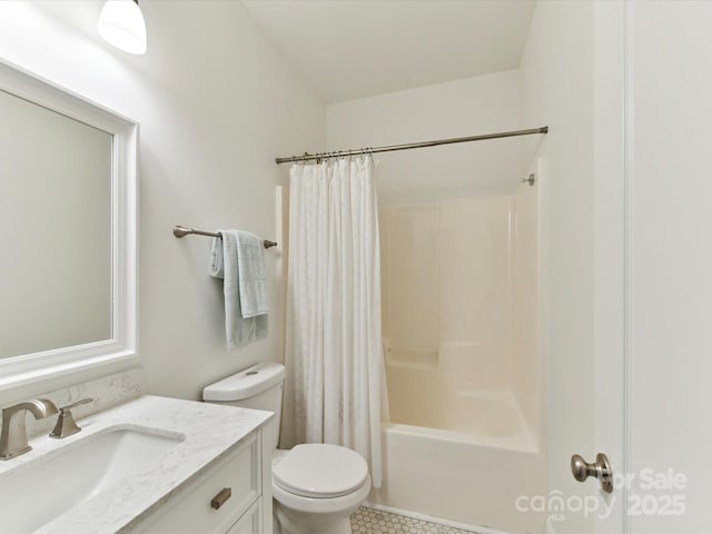 bathroom with vanity, tile patterned flooring, shower / bath combo, and toilet