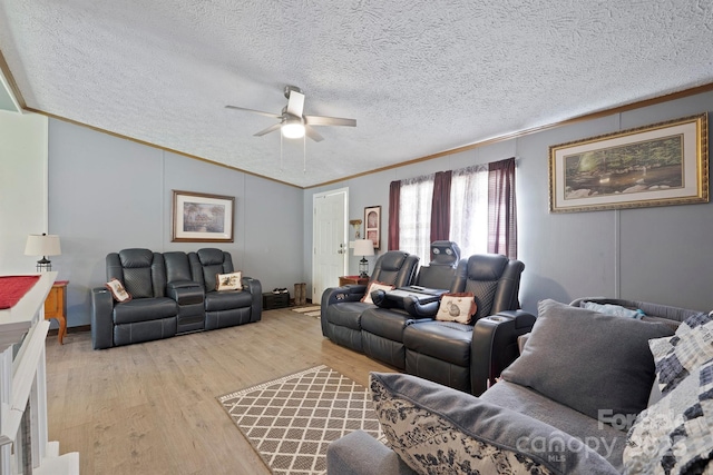 6282 Lor Rd, Morganton, NC 28655 - living area featuring light wood-style flooring, a textured ceiling, a ceiling fan, and ornamental molding