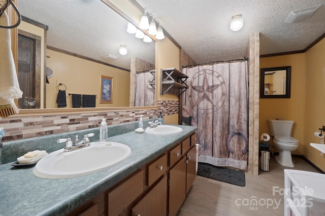 6282 Lor Rd, Morganton, NC 28655 - full bath with wood finished floors, visible vents, toilet, and a sink