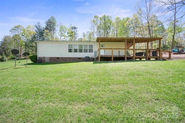 6282 Lor Rd, Morganton, NC 28655 - back of house featuring a wooden deck, crawl space, and a yard